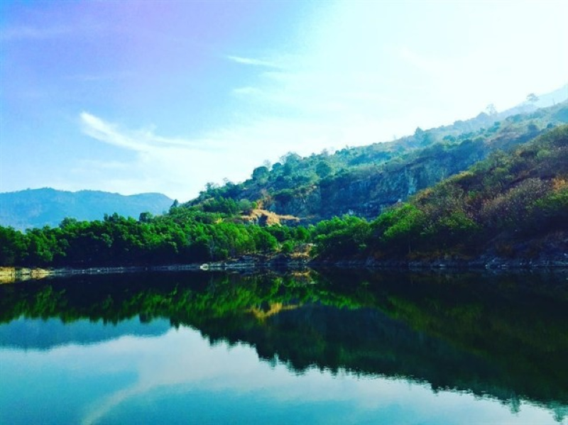 The pristine Ma Thien Lanh Valley nestled between three surrounding mountains.