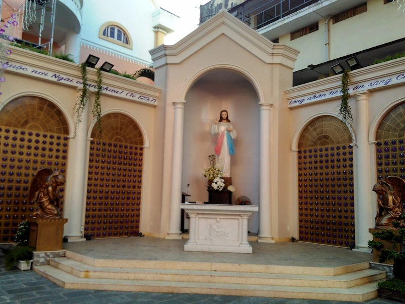 A serene outdoor shrine at Tan Dinh Church