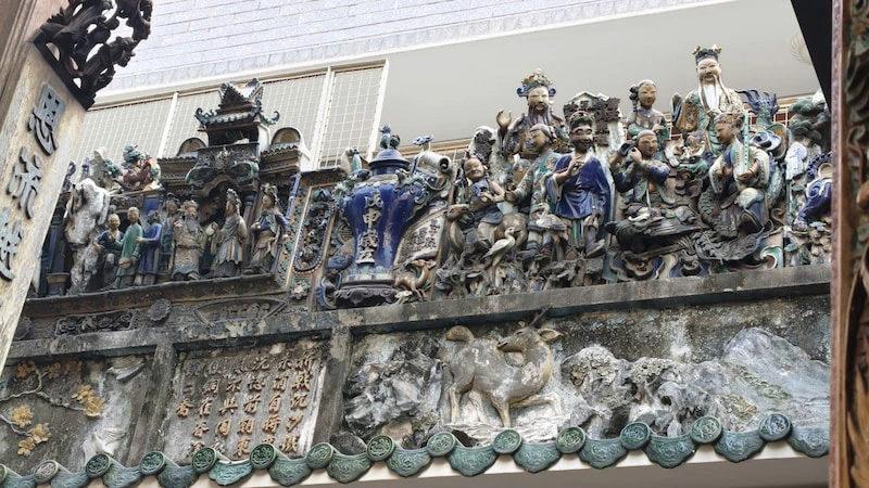 Exquisite ceramic figurines and intricate sculptures on the rooftop