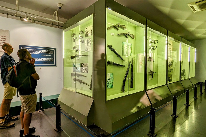 A collection of diverse weaponry and historical artifacts on display